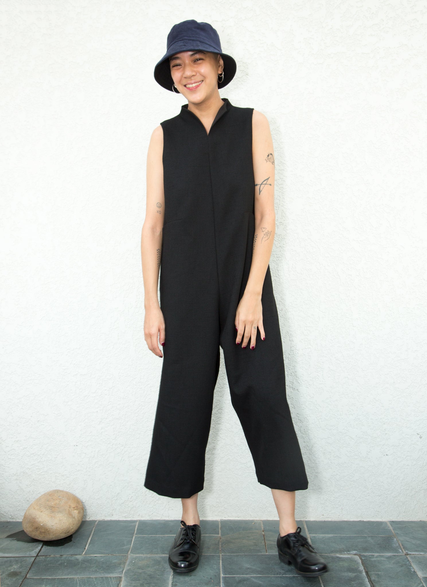 black sleeveless onesie